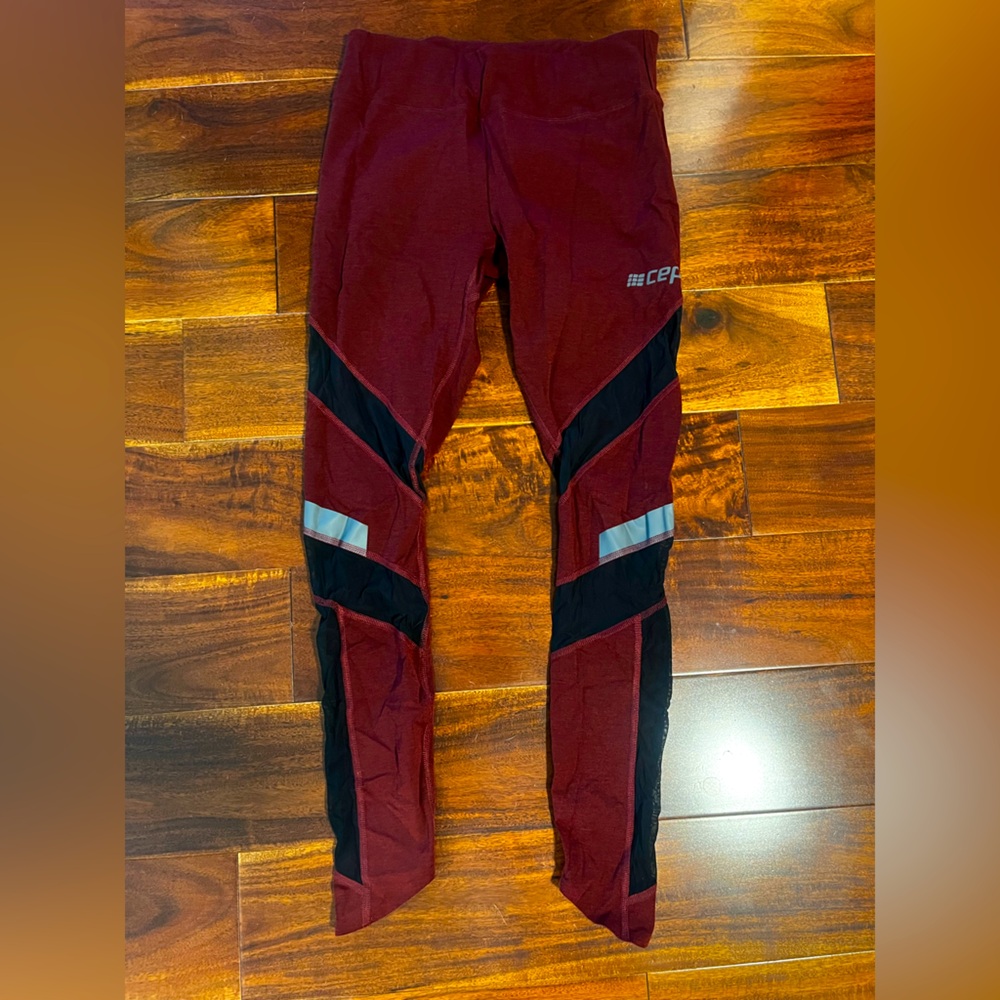 Women’s CEP burgundy and black mesh leggings, size medium